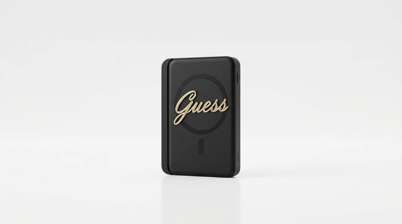 cutting edge electronics online Canada. premium tech accessories Canada. Guess Powerbank Magsafe Metal Script Logo 5000mAh 15W Black. Gallery image 10. Lines name one specific SKU—never substitute a generic lookalike from the category. After review passes, each render should still read as a fresh studio viewpoint of that same physical unit.