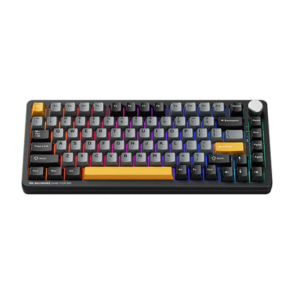 future tech gadgets Canada. premium tech accessories Canada. Machenike K600-B82W RGB Mechanical Keyboard. Gallery image 2. The keyboard is centered in the frame, showcasing a compact design with a black base and a mix of gray and colorful keycaps. The keys feature vibrant accents in orange, yellow, and purple, with a glossy finish that reflects light softly.