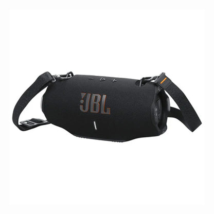 future tech gadgets Canada. smart tech store Canada. JBL Xtreme 4 Portable waterproof speaker. Gallery image 3. The portable speaker is positioned at a slight angle, showcasing its cylindrical shape. It features a matte black fabric exterior with the "JBL" logo prominently displayed in a contrasting orange. A strap is attached to one side, suggesting portability. The top surface includes tactile buttons for volume and playback, while a small LED indicator is visible on the front.