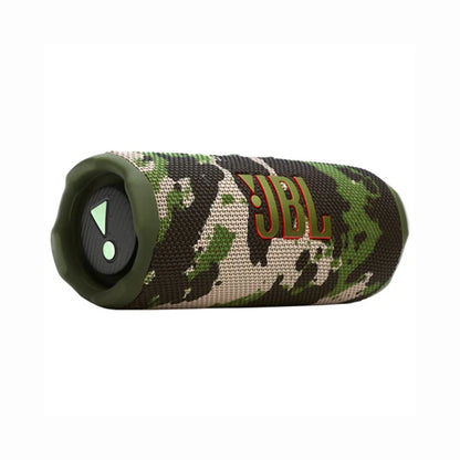 future tech gadgets Canada. smart tech store Canada. JBL Flip 7 Portable waterproof and drop-proof speaker. Gallery image 3. The portable speaker is positioned at a slight angle, showcasing its cylindrical shape. It features a camouflage pattern in shades of green, black, and beige, with a prominent red "JBL" logo on the side. The speaker has a textured fabric surface and a rubberized end cap with a power button that includes a light indicator.