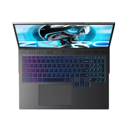 future tech gadgets Canada. smart tech store Canada. ThundeRobot ZERO16 Pro U9 Gaming Laptop. Gallery image 2. The laptop is viewed from above, centered in the frame with the screen open at a slight angle. The display features a vibrant graphic of a futuristic robot, predominantly in blue tones. The keyboard is illuminated with a gradient of purple to blue backlighting, highlighting the keys against the matte black surface.
