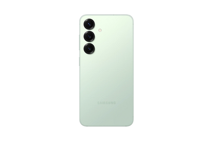cutting edge electronics online Canada. smart tech store Canada. New Samsung Galaxy S25. Gallery image 6. The image shows a light green smartphone positioned centrally against a black background. The back of the phone features three circular camera lenses arranged vertically, with a small flash located above the top lens. The surface of the phone has a smooth, matte finish, and the brand name "SAMSUNG" is subtly embossed near the bottom.