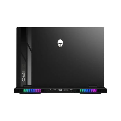 future tech gadgets Canada. smart tech store Canada. ThundeRobot ZERO16 Pro U9 Gaming Laptop. Gallery image 3. The laptop is positioned centrally in the frame, showcasing its sleek black exterior from a rear angle. The surface is smooth with a subtle sheen, reflecting soft light. The logo is prominently displayed at the center, while the word "ZERO" is visible on the left side. Colorful LED lights are integrated into the cooling vents at the bottom, adding a vibrant touch.