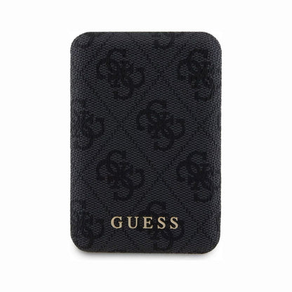 future tech gadgets Canada. premium tech accessories Canada. Guess BP MagSafe Case + PWB 5000mAh 4G. Gallery image 3. The product is a black cardholder, prominently displayed in the center of the frame against a seamless white background. The textured surface features a subtle pattern of interlocking "G" logos, creating a sophisticated look. At the bottom, the brand name "GUESS" is embossed in gold, adding a touch of elegance.