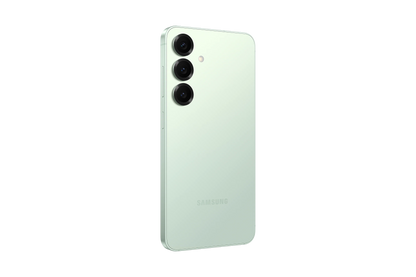 cutting edge electronics online Canada. smart tech store Canada. New Samsung Galaxy S25. Gallery image 12. The smartphone is positioned at a slight angle, showcasing its sleek, mint green back. Three circular camera lenses are aligned vertically on the upper left, with a small flash located above them. The surface is smooth and glossy, reflecting light subtly. The brand name "Samsung" is embossed near the bottom in a light color, blending with the background.