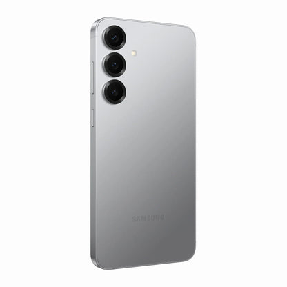 smart tech store Canada. premium tech accessories Canada. New Samsung Galaxy S25 Plus. Gallery image 10. The smartphone is positioned at a slight angle, showcasing its sleek, reflective silver back. Three circular camera lenses are aligned vertically on the left side, with a small flash above them. The device features a minimalist design with smooth edges and a subtle "SAMSUNG" logo near the bottom. The background is plain white, emphasizing the phone's polished surface and modern aesthetic.