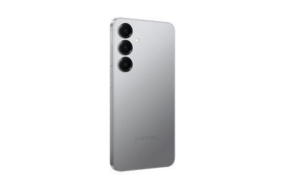 cutting edge electronics online Canada. smart tech store Canada. New Samsung Galaxy S25. Gallery image 9. The smartphone is positioned at a slight angle, showcasing its sleek, silver back. It features three circular camera lenses arranged vertically, with a small flash located above them. The surface has a glossy finish that reflects light subtly, enhancing its modern look.