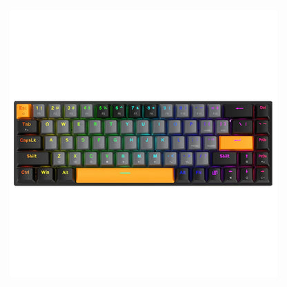 future tech gadgets Canada. premium tech accessories Canada. Machenike K500-B68 Wired RGB Mechanical Keyboard. Gallery image 1. The keyboard is displayed from a top-down view, centered in the frame against a seamless white background. It features a compact layout with a mix of black and orange keycaps, the orange keys including the Escape and Shift keys. The key legends are illuminated in a vibrant array of colors, transitioning from green to blue to purple, creating a dynamic lighting effect.
