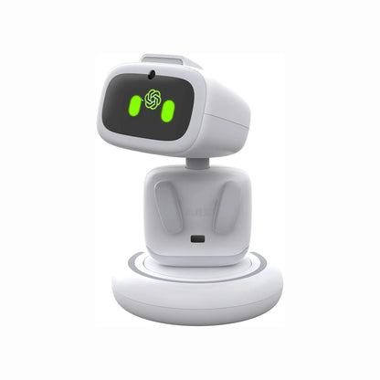 smart tech store Canada. premium tech accessories Canada. AIBI Pocket AI Companion Pet Robot. Gallery image 2. The product is a small, white robot-like device positioned centrally against a plain white background. It features a rounded head with a black front panel displaying two green lights and a logo in the center. The body is smooth and rounded, with a simple design that includes two side panels resembling ears. The robot is mounted on a circular base with a subtle grey ring around it.