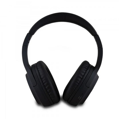 future tech gadgets Canada. premium tech accessories Canada. DKNY Headphones Bluetooth. Gallery image 3. The headphones are positioned centrally in the frame, facing forward with a slight angle to showcase both ear cups. They feature a sleek, matte black finish with plush ear cushions for comfort. The headband is also black and padded, providing a cohesive look. On the right ear cup, a small USB port is visible, while the left side has a smooth surface without visible buttons.