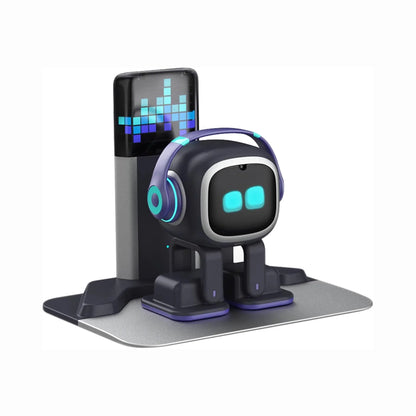 smart tech store Canada. premium tech accessories Canada. Living AI EMO AI Desktop Pet Companion Robot. Gallery image 6. A small, cartoonish robot figure with a round head and large, expressive eyes stands on a sleek, silver base. The robot wears oversized purple headphones, and its body features a matte black finish with glowing blue accents. Behind it, a vertical display shows a colorful sound wave graphic, suggesting it may be a speaker or music player.