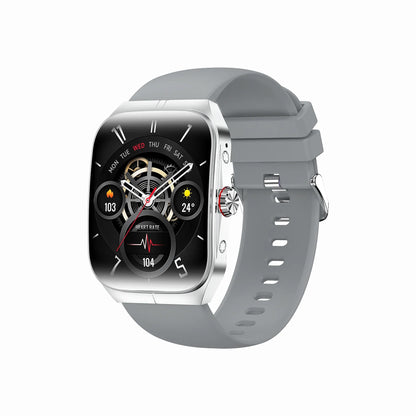 future tech gadgets Canada. smart tech store Canada. Techtron FAMO89S Fashion Smart Watch. Gallery image 3. The smartwatch is angled slightly to the right, showcasing its rectangular face with a glossy black display. The screen features various circular dials displaying heart rate, weather, and day of the week, with white and red accents. The watch has a silver metal frame and a soft gray silicone strap that wraps around the wrist.