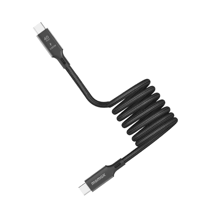 next gen electronics shop. buy electronics online Canada. Momax Mag.Link 240W Usb-C To Usb-C Usb 4 40Gbps Magnetic Cable 1.5M. Gallery image 1. A coiled black charging cable is prominently displayed against a white background. The cable features a textured fabric exterior, giving it a durable appearance. One end has a connector with a white tip, while the other end is slightly angled, showcasing the brand name "momax" printed in white.
