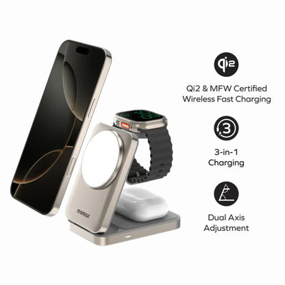 smart tech store Canada. premium tech accessories Canada. Momax 1-Charge Q.Port Qi2 3-in-1 Magnetic Wireless Charging Stand. Gallery image 3. A sleek, silver 3-in-1 wireless charging station is prominently displayed in the center of the image, with a smartphone leaning against it on the left, an Apple Watch resting on the right, and a pair of AirPods positioned below. The charging station features a circular charging pad and a matte finish, while the smartphone has a glossy black screen.