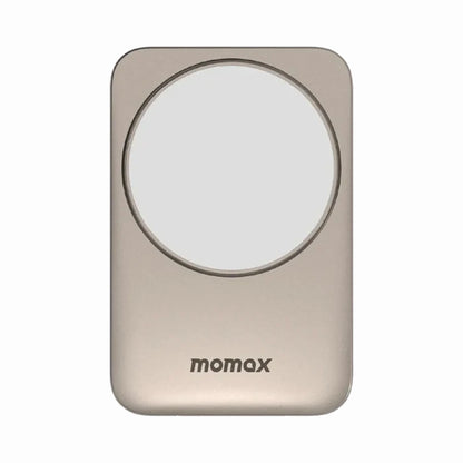 smart tech store Canada. premium tech accessories Canada. Momax 1-Charge Q.Port Qi2 3-in-1 Magnetic Wireless Charging Stand. Gallery image 1. The product is a sleek, rectangular wireless charger with a smooth, metallic gold finish. It features a prominent circular charging area in the center, which is white and slightly raised. The brand name "momax" is printed in small, dark letters near the bottom edge.