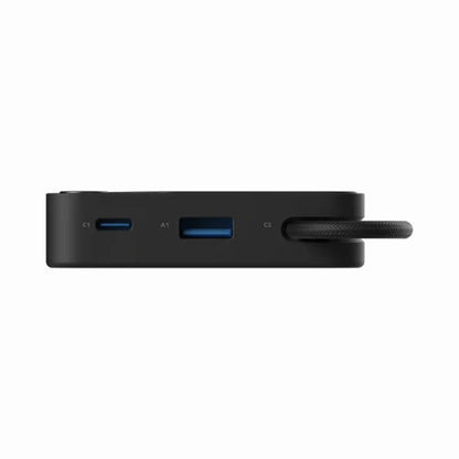 premium tech accessories Canada. wireless audio Canada. Momax 1-Power X1 Battery Pack 20000mAh With Built-In USB-C Cable. Gallery image 2. The product is a sleek, rectangular black device positioned horizontally in the center of the frame against a seamless white background. The top surface features three ports labeled "C1," "A1," and "C2," with the "A1" port highlighted in blue. A textured black cable is attached to the "C2" port, adding a functional detail.