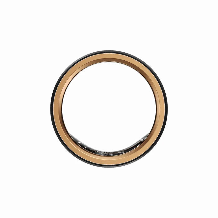smart tech store Canada. premium tech accessories Canada. Momax 1-Sense Active Smart Ring. Gallery image 4. The image features a circular product with a glossy black outer rim and a shiny gold inner trim, creating a striking contrast. The product is centered in the frame against a seamless white background, allowing for clear visibility of its details. The inner section appears reflective, suggesting a glass or polished surface.
