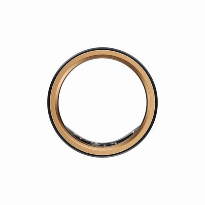 smart tech store Canada. premium tech accessories Canada. Momax 1-Sense Active Smart Ring. Gallery image 4. The image features a circular product with a glossy black outer rim and a shiny gold inner trim, creating a striking contrast. The product is centered in the frame against a seamless white background, allowing for clear visibility of its details. The inner section appears reflective, suggesting a glass or polished surface.