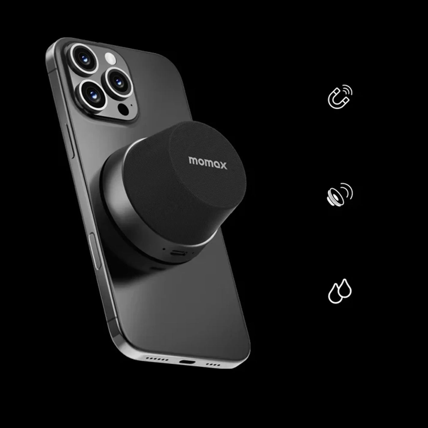 future tech gadgets Canada. premium tech accessories Canada. Momax 1-Vibe Go Magnetic Wireless Speaker. Gallery image 1. A sleek black smartphone is positioned at an angle, showcasing its glossy finish and three rear cameras. Attached to the back is a round, black speaker with a textured surface, prominently displaying the "momax" logo on top. The background is solid black, enhancing the product's modern aesthetic.