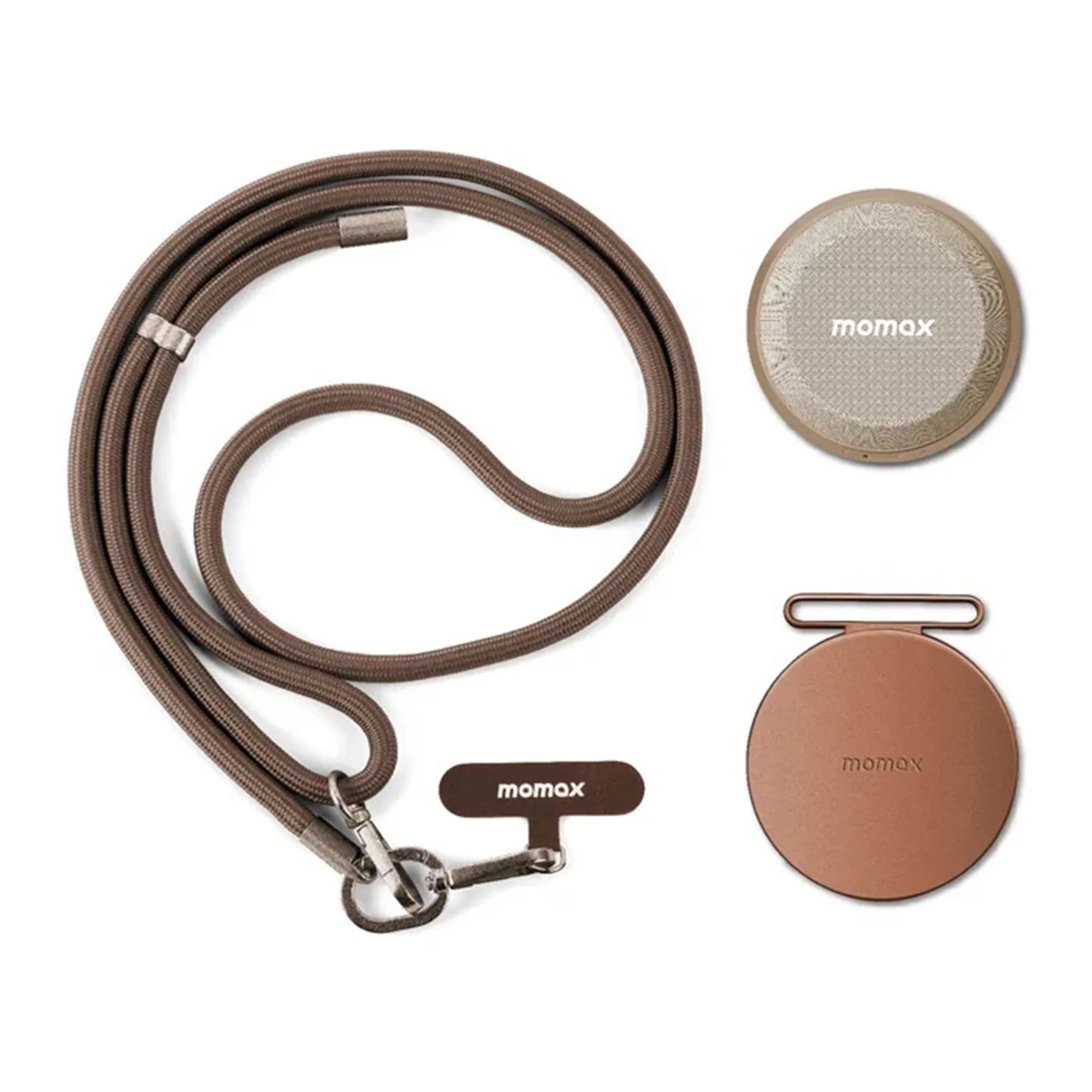 future tech gadgets Canada. premium tech accessories Canada. Momax 1-Vibe Go Magnetic Wireless Speaker. Gallery image 14. A brown, braided leash is coiled in the foreground, featuring a metal clip at one end. Next to it, a round, light brown device with a textured surface displays the "momax" logo prominently. To the right, a smooth, circular, darker brown accessory also features the "momax" branding.