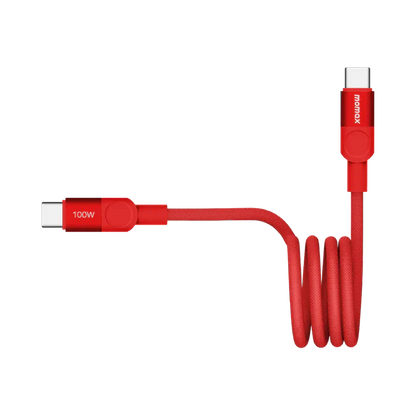 future tech gadgets Canada. smart tech store Canada. Momax Mag.Link 100W Usb-C To Usb-C Magnetic Cable 1M. Gallery image 13. A vibrant red charging cable is prominently displayed, coiled in the center of the frame. The cable features two connectors: one USB-C end and one that is labeled "100W," both with a glossy finish. The background is plain and seamless, enhancing the cable's bright color. The lighting is even, highlighting the cable's texture and sheen.