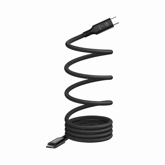 next gen electronics shop. buy electronics online Canada. Momax Mag.Link 240W Usb-C To Usb-C Usb 4 40Gbps Magnetic Cable 1.5M. Gallery image 1. A black USB-C charging cable is coiled in a spiral shape, prominently displayed against a seamless white background. The cable features a textured fabric exterior, giving it a durable appearance. One end of the cable has a USB-C connector, while the other end is slightly obscured but also appears to be a USB-C connector.