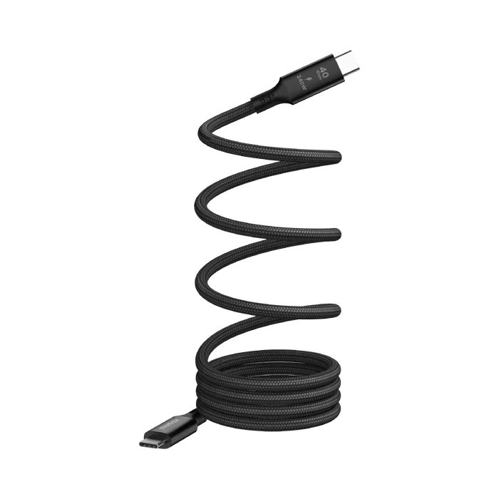 next gen electronics shop. buy electronics online Canada. Momax Mag.Link 240W Usb-C To Usb-C Usb 4 40Gbps Magnetic Cable 1.5M. Gallery image 3. The image features a black braided USB cable, coiled in a loose spiral. The cable is centered in the frame, with one end prominently displayed, showcasing a USB-C connector. The background is plain and seamless, enhancing the focus on the cable.