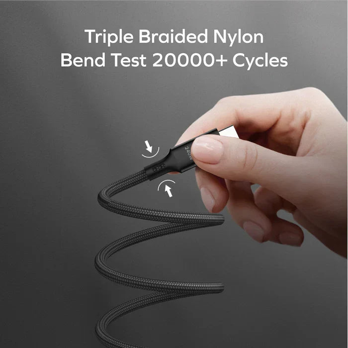 next gen electronics shop. buy electronics online Canada. Momax Mag.Link 240W Usb-C To Usb-C Usb 4 40Gbps Magnetic Cable 1.5M. Gallery image 6. A hand holds a black, triple-braided nylon charging cable, which is coiled in a loose spiral. The cable features a sleek, glossy connector at one end, while the other end is not visible. The background is a smooth, dark surface that enhances the cable's texture and color.