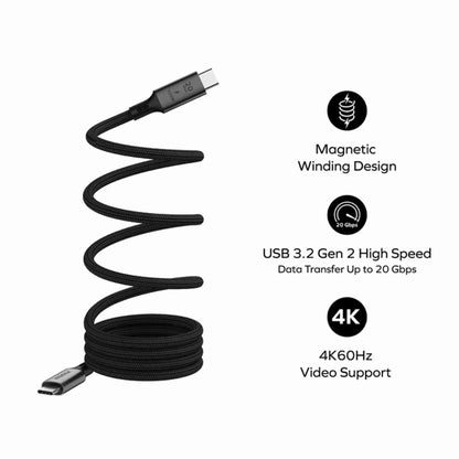 smart tech store Canada. next gen electronics shop. Momax Mag Link 100W USB-C to USB-C USB 3.2 Gen 2x2 Magnetic Cable 1M. Gallery image 1. A black braided USB cable is coiled in a spiral shape, with one end prominently displayed and the other end partially hidden. The cable's surface texture appears durable and flexible.