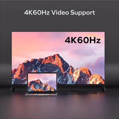 smart tech store Canada. next gen electronics shop. Momax Mag Link 100W USB-C to USB-C USB 3.2 Gen 2x2 Magnetic Cable 1M. Gallery image 3. A large television displays a vibrant mountain landscape with pink and orange hues in the sky, prominently featuring the text "4K60Hz Video Support" in bold, white letters. In the foreground, a laptop sits on a dark surface, showcasing the same mountain image on its screen.