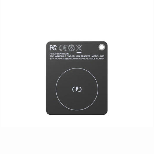future tech gadgets Canada. smart tech store Canada. Momax Pincard Pro Mini Rechargeable Find My Tracker. Gallery image 1. The image features a compact, square black device centered in the frame, with a smooth matte finish. A circular charging symbol is prominently displayed in the center, surrounded by a white outline. The top edge includes printed text detailing the product name, model, and specifications, all in white font.