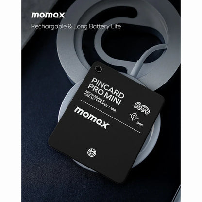 future tech gadgets Canada. smart tech store Canada. Momax Pincard Pro Mini Rechargeable Find My Tracker. Gallery image 3. The image features a black tracking card, labeled "PINCARD PRO MINI," prominently displayed in the center. It rests on a soft, circular gray surface, with a subtle texture that contrasts against the dark background.