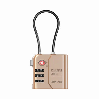 future tech gadgets Canada. smart tech store Canada. Momax Pinlock TSA Padlock Find My Location. Gallery image 2. The image features a gold-colored combination lock positioned centrally against a white background. The lock has a sleek, rectangular body with a matte finish, and a flexible black cable loop at the top. Three dials on the front display numbers, with the digits 8, 7, and 1 visible. The brand logo, a red diamond shape, is located on the upper left corner of the lock.