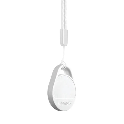 future tech gadgets Canada. smart tech store Canada. Momax Pinpop Lite Find My Tracker. Gallery image 6. A small, round white device hangs from a thin, silver lanyard, centered against a seamless white background. The device has a smooth, glossy finish with a subtle embossed logo that reads "momax" near the bottom. The lighting is bright and even, highlighting the sleek design without any shadows. The lanyard appears sturdy, suggesting it is designed for easy attachment to bags or other items.