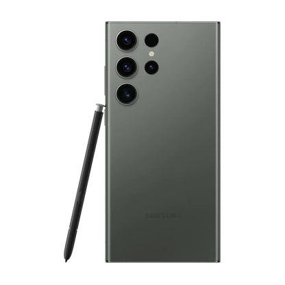 cutting edge electronics online Canada. smart tech store Canada. Premium Samsung Galaxy S23 Ultra. Gallery image 6. The smartphone is positioned centrally, showcasing its sleek, matte green back. Three circular camera lenses are aligned vertically on the left side, with a small flash above them. A black stylus is partially inserted into the device, resting beside it. The background is a seamless white, enhancing the phone's modern design.