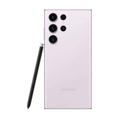 cutting edge electronics online Canada. smart tech store Canada. Premium Samsung Galaxy S23 Ultra. Gallery image 8. The smartphone is centered in the frame, showcasing its sleek, light pink back. Three camera lenses are arranged vertically on the upper left, with a small flash above them. A black stylus is positioned to the right of the phone, partially inserted into its slot. The background is a seamless white, providing a clean contrast to the device.