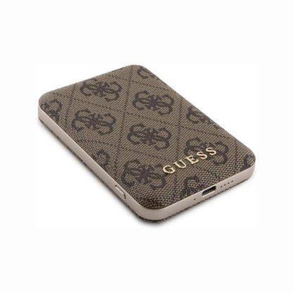 future tech gadgets Canada. premium tech accessories Canada. Guess BP MagSafe Case + PWB 5000mAh 4G. Gallery image 5. The product is a smartphone case positioned at a slight angle, showcasing its textured surface. The case features a brown fabric with a subtle pattern and the word "GUESS" embossed in gold at the bottom. The edges are smooth and metallic, contrasting with the matte finish of the fabric. The background is a seamless white, emphasizing the case's design.