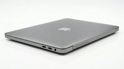 future tech gadgets Canada. smart tech store Canada. Certified Apple MacBook Pro 13″ (2020) A2251. Gallery image 5. The laptop is positioned at a slight angle, showcasing its sleek, silver aluminum body against a seamless white background. The Apple logo is visible on the top surface, reflecting light softly.