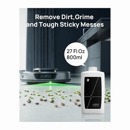 smart tech store Canada. premium tech accessories Canada. 3i S10 Ultra Cleaning Solution. Gallery image 1. A sleek, round robotic cleaner is positioned in the foreground, slightly angled to showcase its front features, including dual sensors and a green light projecting onto the floor. Scattered across a light-colored surface are small debris pieces, suggesting a cleaning task in progress.