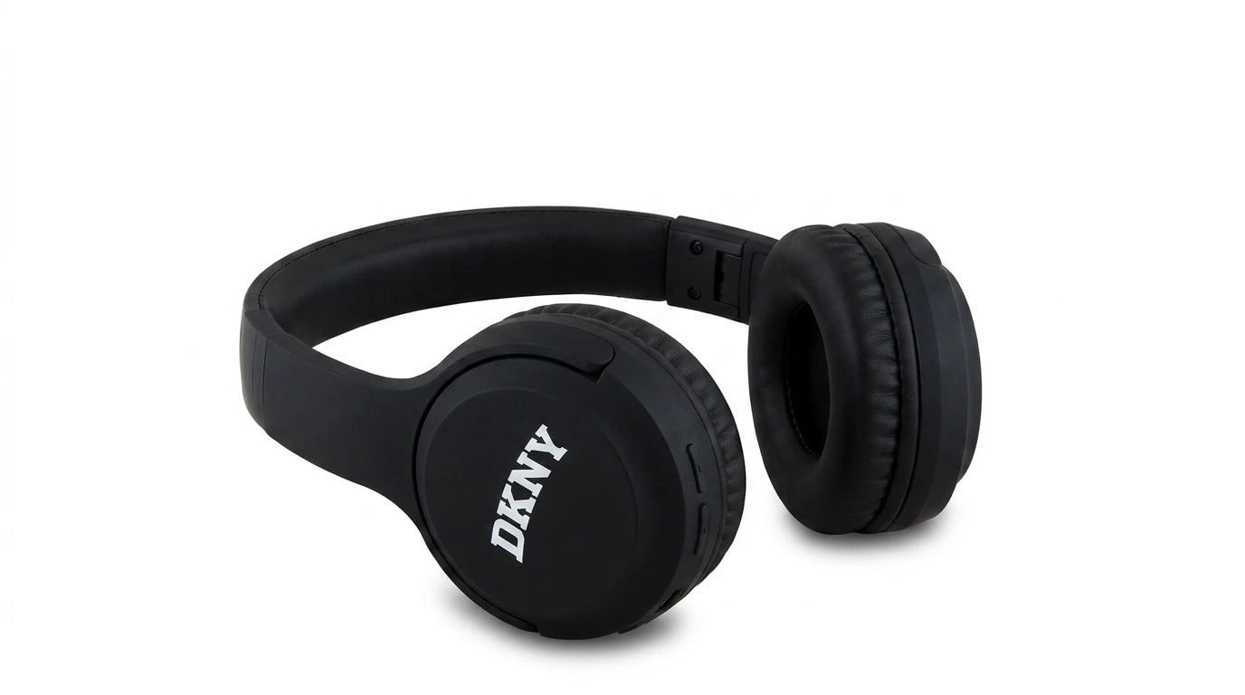 future tech gadgets Canada. premium tech accessories Canada. DKNY Headphones Bluetooth. Gallery image 4. Lines name one specific SKU—never substitute a generic lookalike from the category. After review passes, each render should still read as a fresh studio viewpoint of that same physical unit.