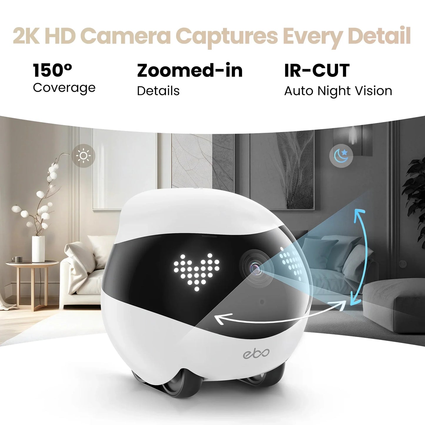 smart tech store Canada. premium tech accessories Canada. Enabot Ebo Air 2 Companion Robot. Gallery image 6. The image features a compact, rounded white robot with a glossy black band around its midsection, displaying a heart-shaped light pattern on its front. It is positioned slightly off-center, angled to the right, showcasing its camera lens and wheels. The background includes a modern living room setting with a light-colored sofa and a decorative plant, illuminated by soft, natural light.