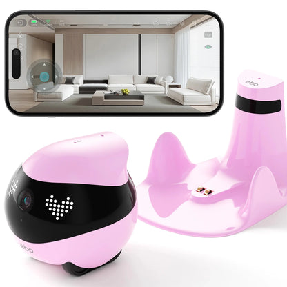 smart tech store Canada. premium tech accessories Canada. Enabot Ebo Air 2 Companion Robot. Gallery image 3. A pink robotic device with a glossy finish is positioned in the foreground, featuring a black band around its midsection with heart-shaped LED lights. It has a small camera lens on the front and rolls on two wheels. Behind it, a matching pink charging dock is visible, designed with two raised sections for stability.