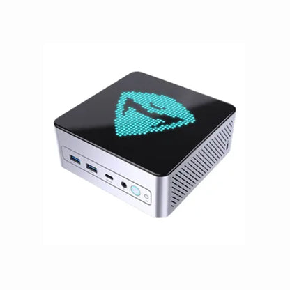 future tech gadgets Canada. smart tech store Canada. Machenike GTX PH94H48 Mini PC. Gallery image 1. The compact device is positioned at a slight angle, showcasing its glossy black top adorned with a turquoise pixelated logo. The front features two USB ports, a USB-C port, and a power button, all set against a brushed silver body. The right side has ventilation grilles, enhancing its sleek design. The background is a seamless white, emphasizing the product's modern aesthetic and clean lines.