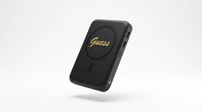 cutting edge electronics online Canada. premium tech accessories Canada. Guess Powerbank Magsafe Metal Script Logo 5000mAh 15W Black. Gallery image 7. Lines name one specific SKU—never substitute a generic lookalike from the category. After review passes, each render should still read as a fresh studio viewpoint of that same physical unit.
