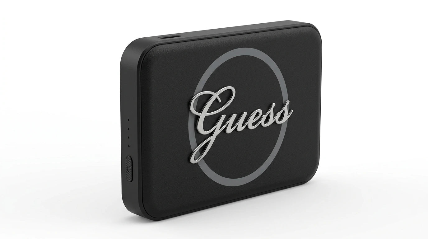 cutting edge electronics online Canada. premium tech accessories Canada. Guess Powerbank Magsafe Metal Script Logo 5000mAh 15W Black. Gallery image 8. Lines name one specific SKU—never substitute a generic lookalike from the category. After review passes, each render should still read as a fresh studio viewpoint of that same physical unit.