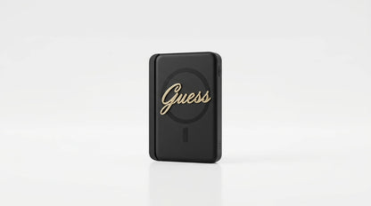 cutting edge electronics online Canada. premium tech accessories Canada. Guess Powerbank Magsafe Metal Script Logo 5000mAh 15W Black. Gallery image 10. Lines name one specific SKU—never substitute a generic lookalike from the category. After review passes, each render should still read as a fresh studio viewpoint of that same physical unit.