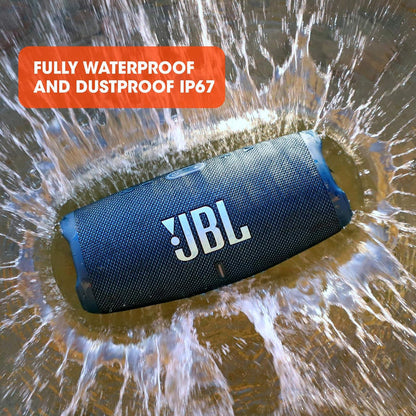 future tech gadgets Canada. premium tech accessories Canada. JBL Charge 5 Portable Waterproof Speaker with Powerbank. Gallery image 4. A black JBL speaker is centered in the frame, partially submerged in water, creating splashes around it. The speaker features a textured surface with a prominent white JBL logo on the front.