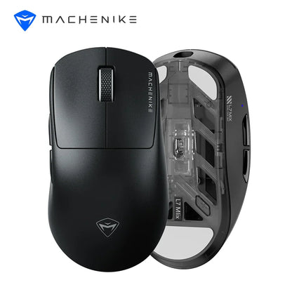 future tech gadgets Canada. premium tech accessories Canada. Machenike L7 Mix Tri-Mode Mouse. Gallery image 2. The image features a sleek black gaming mouse positioned at an angle, showcasing both its top and side profiles. The top view reveals a smooth surface with a textured scroll wheel and the brand name "MACHENIKE" printed on the left side. The side profile displays a transparent section, allowing a glimpse of the internal components, with a small blue LED indicator visible.