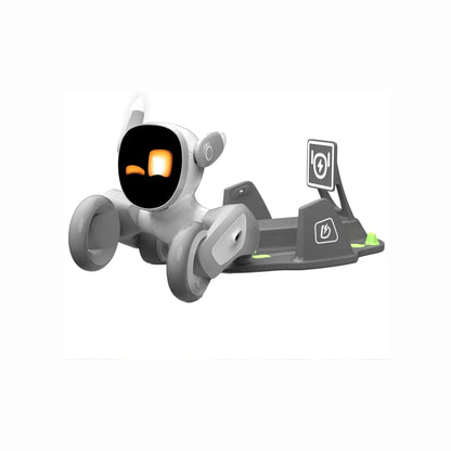 smart tech store Canada. premium tech accessories Canada. Loona AI Pet Robot. Gallery image 1. A small, playful robot toy is positioned slightly angled to the right, showcasing its rounded body and large, expressive face with a black screen and glowing orange eyes. The robot has a glossy white finish with gray accents and four smooth wheels. It sits on a gray charging base that features two icons indicating power and charging status.