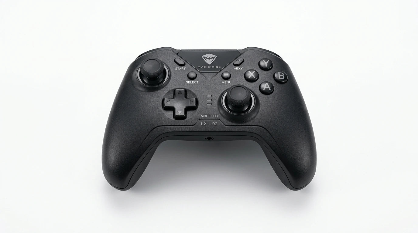 future tech gadgets Canada. premium tech accessories Canada. Machenike G5 Pro V2 Tri-Mode Controller. Gallery image 10. The game controller is centered in the frame, viewed from above against a seamless white background. It features a matte black finish with a textured grip, and the layout includes two analog sticks, a directional pad, and several buttons labeled A, B, X, and Y. The controller has a triangular logo at the top and visible labels for the L2 and R2 buttons.